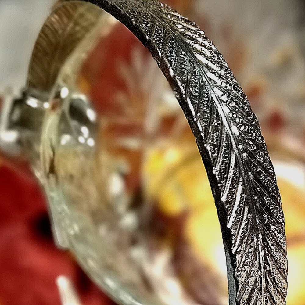 999 STERLING SILVER FEATHER DESIGN BRACELET. Adjustable.